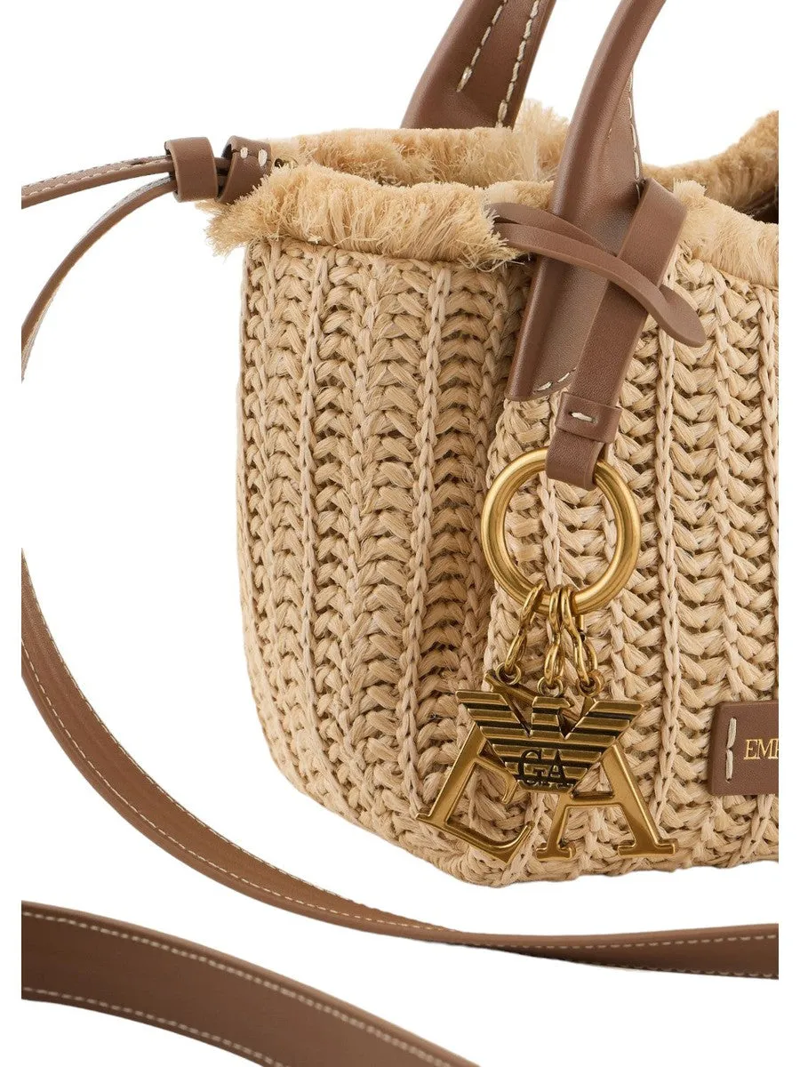 Borsa a mano in paglia intrecciata con charm logo