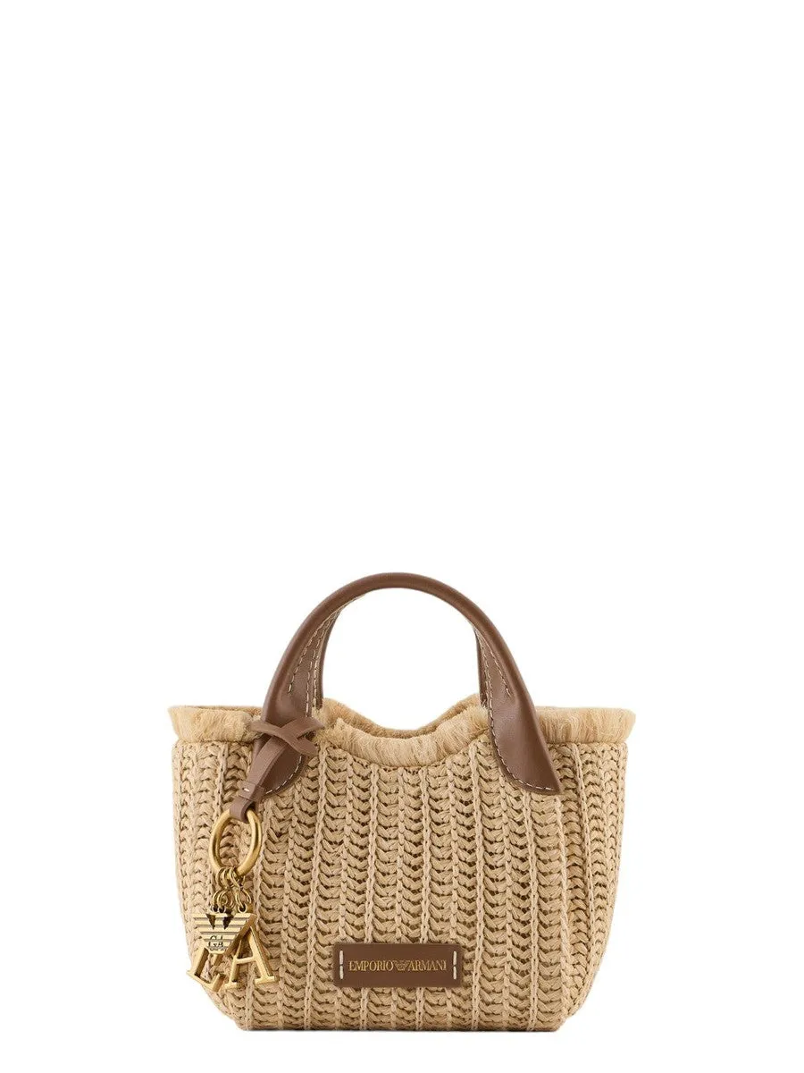 Borsa a mano in paglia intrecciata con charm logo