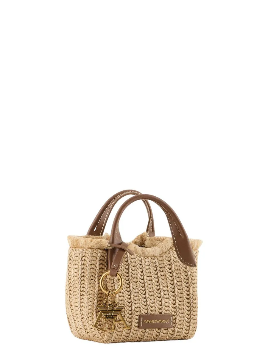 Borsa a mano in paglia intrecciata con charm logo